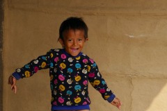 La gioia di questa bimba Tharu di nome Chandra (il suo nome significa "luna" ed evidenzia la sua delicatezza ed il suo entusiasmo contagioso) con cui sto giocando a fare le smorfie, viene immortalata dall'obiettivo della mia macchina fotografica, villaggio di Harnari, Chitwan National Park, Nepal 2018.